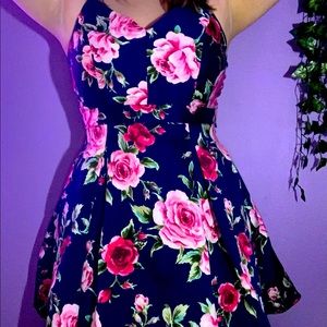Item: Navy blue formal dress with pink flowers and a lace back